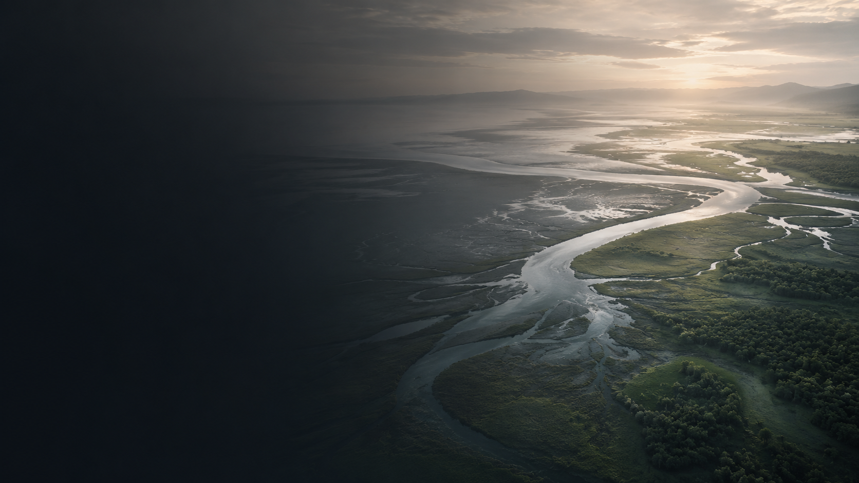 Tidal estuary at dawn — aerial view